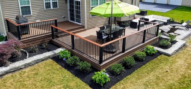 Deck with patio and recently installed new landscape design.