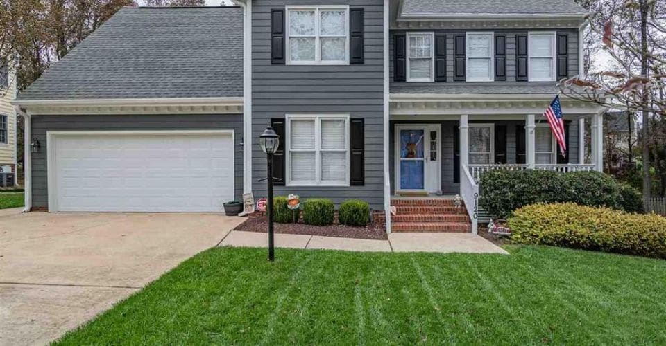 Weed free, green grass in front of a very nice home in Raleigh.