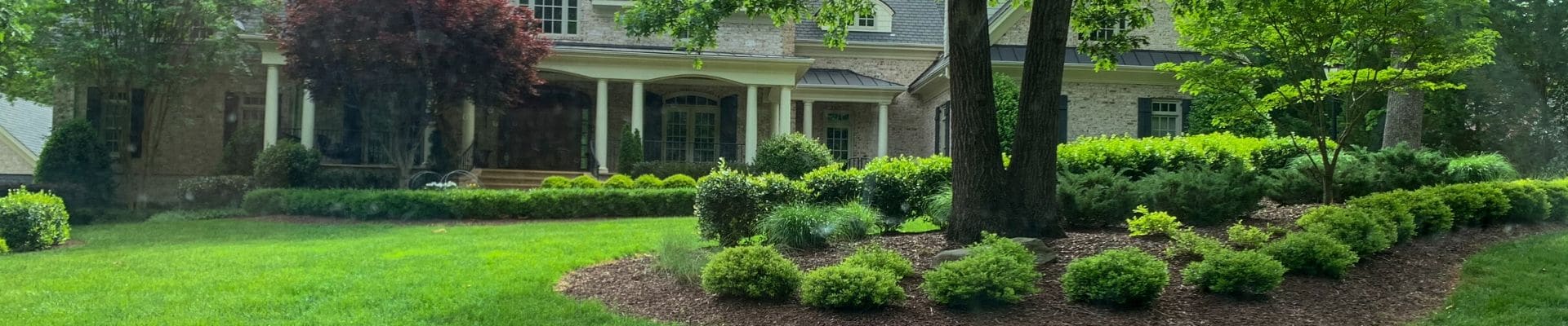 Wide angle shoot of a lawn and landscape customer's lawn.