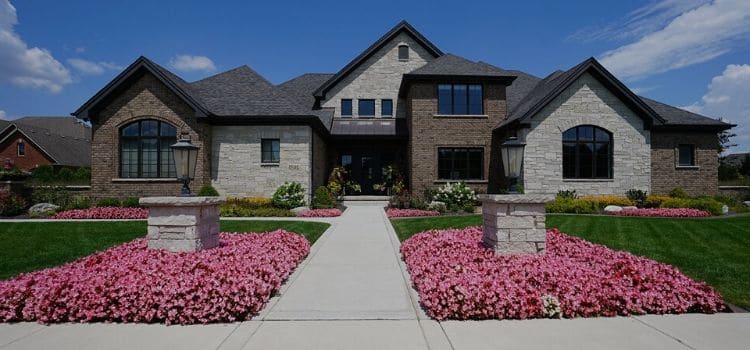 Very nice home with great lawn and landscape with many colorful seasonal flower arrangements.